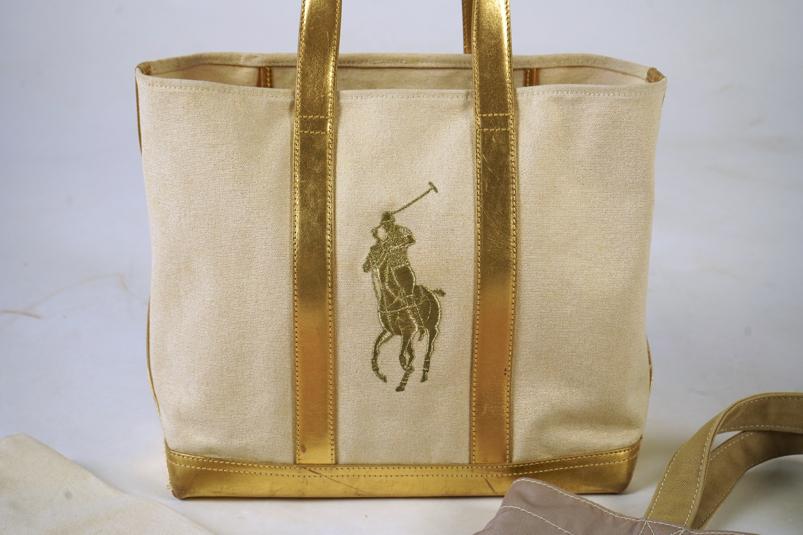 Four bags to include a Ralph Lauren tote bag